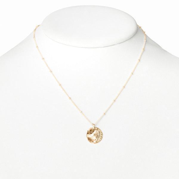 Elke Van Dyke Design Small Gold Eclipse Necklace on mannequin neck